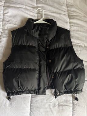 Black puffer vest